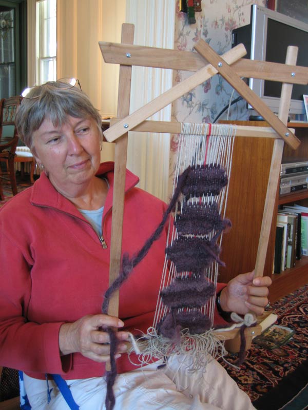 Woman 3D weaving a bowl with a Journey Loom