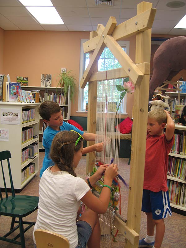 Weaving on a Story Loom in the Children's Library