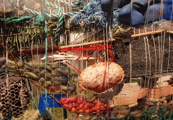 Detail of beach weaving showing rope and other trash from beach